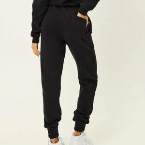 Frankie’s Bikini’s black sweatpants.